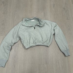 NIA cropped sweater. quarter zip